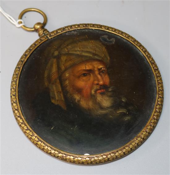 A framed painted plaque of a gent